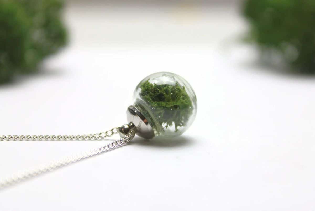 Small glass globe with preserved moss in on silver chain