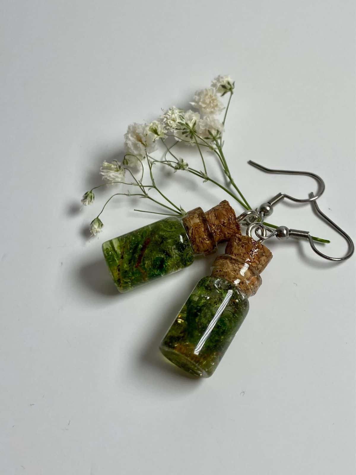 Bottle shaped resin moss small earrings